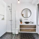 Comment le mobilier suspendu et les WC encastrés permettent-ils d'agrandir visuellement une salle de bain ? le Mesnil-Robert 14380