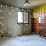 Dépose de l'ancien isolant dans une maison à Toulouse