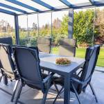 Véranda toit plat moderne - pergola aménagée