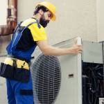 Installation de l'unité extérieure de pompe à chaleur en façade d'immeuble d'habitation - Lille 59