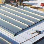 Extension avec toit plat en bac acier
