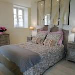 chambre parentale avec verrière entre espace nuit et salle d'eau