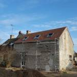 Rénovation de toiture en petites tuiles