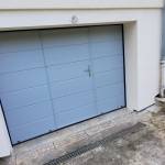 Porte de garage avec portillon