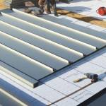 Extension avec toit plat en bac acier