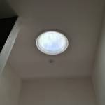 Plancher de verre, souplex et puits de lumière