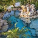 Construction de piscine lagon avec rochers ornementaux - Valence 26