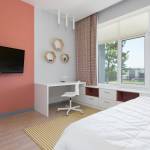 un bureau bien délimité grace aux couleurs du mur