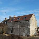 Rénovation de toiture en petites tuiles