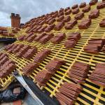 Rénovation d'une toiture en tuiles plates de Bourgogne