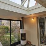 Chauffer sa véranda en hiver avec un poêle à bois moderne - Nantes 44